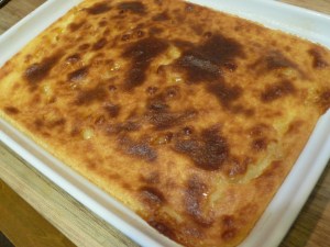 semolinapud Baked Pudding Cooling Down with dots of White Chocolate